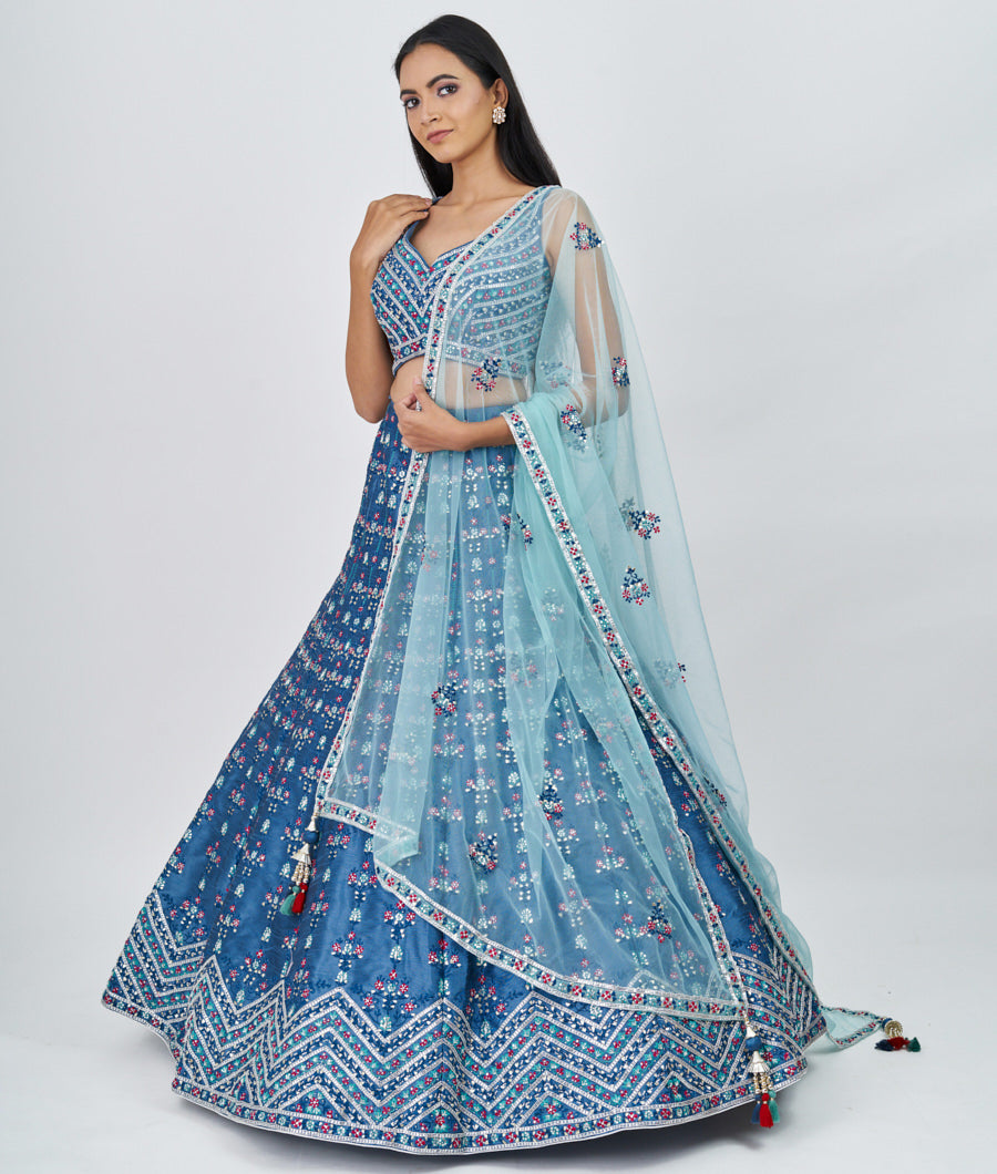 Azure Blue Multi Color Thread Embroidery With Sequins And Gota Patti And Swarovski Stone Work  Lehenga