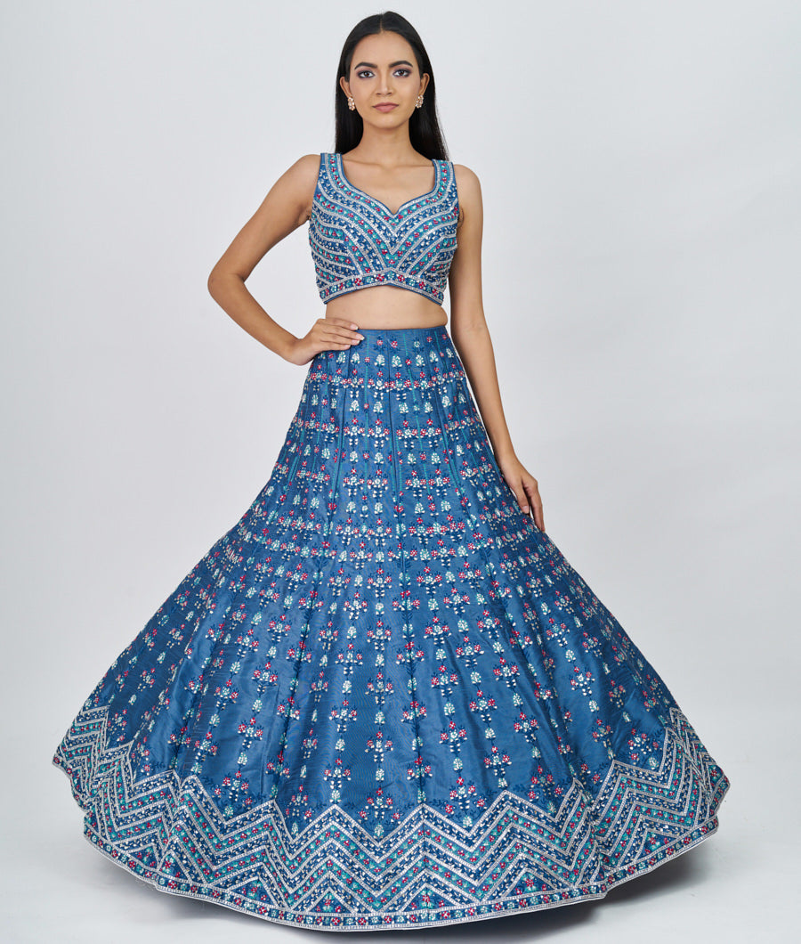 Azure Blue Multi Color Thread Embroidery With Sequins And Gota Patti And Swarovski Stone Work  Lehenga