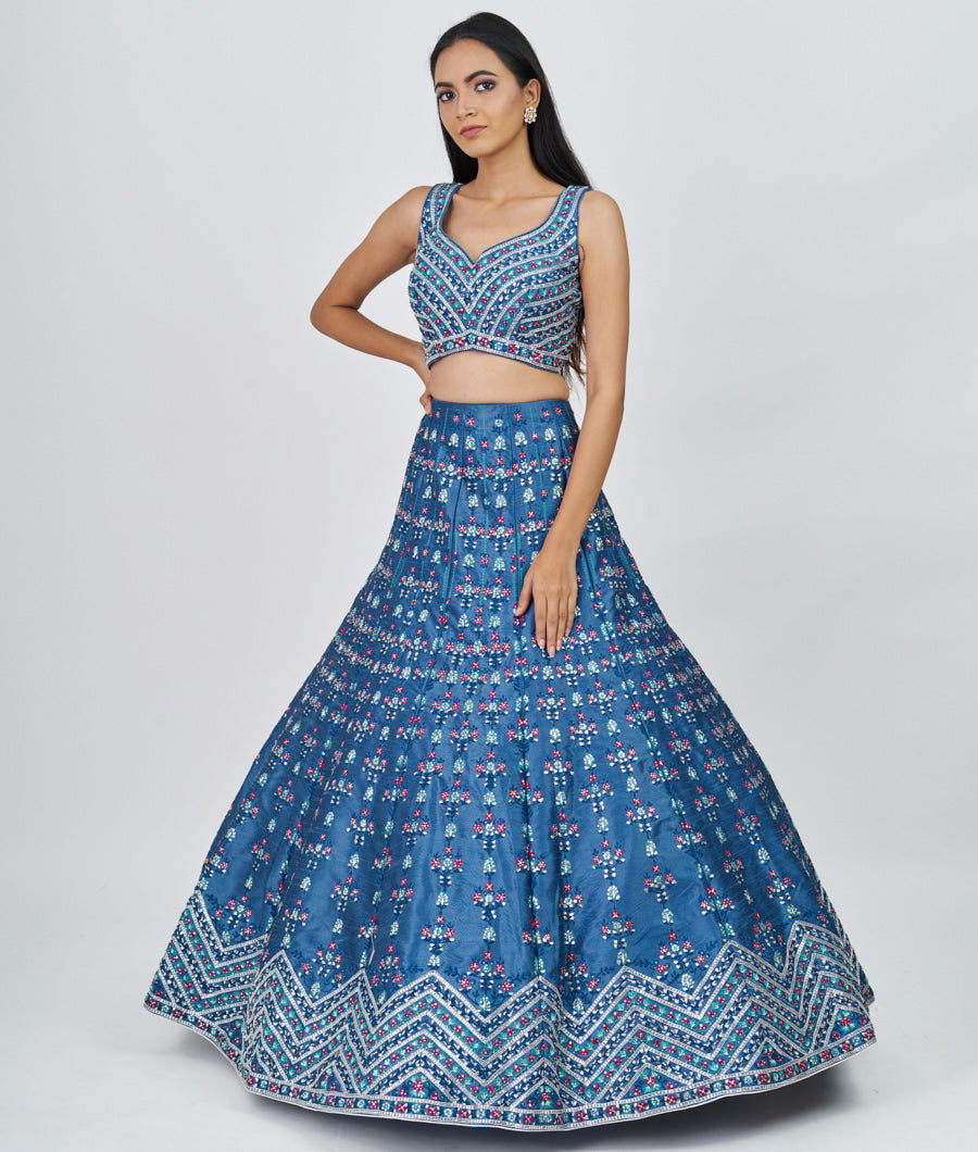 Azure Blue Multi Color Thread Embroidery With Sequins And Gota Patti And Swarovski Stone Work  Lehenga