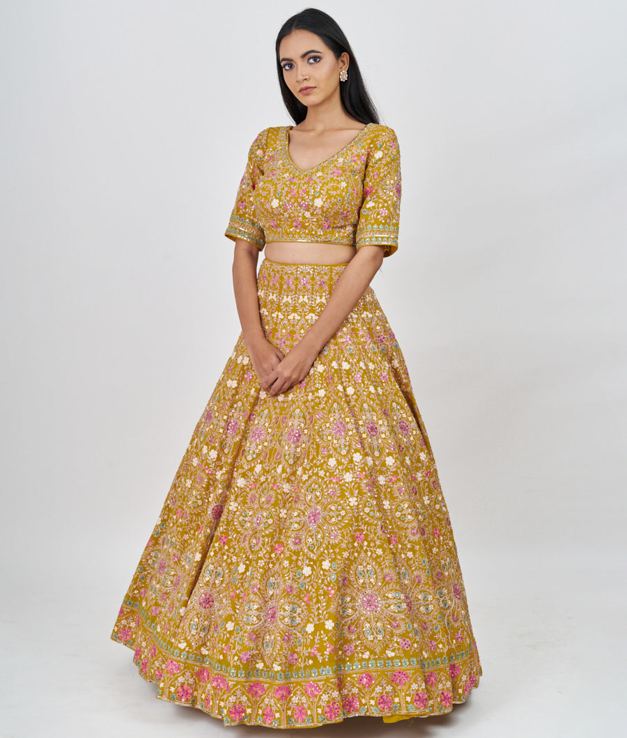 Mustrad Multi Color Thread Embroidery With Sequins And Pearl And Jarkan Stone Work  Lehenga